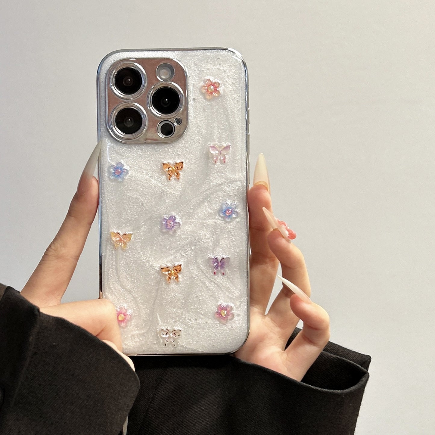 Elegant Glitter Butterfly Phone Case – White Pearl Shine with Floral Embellishments