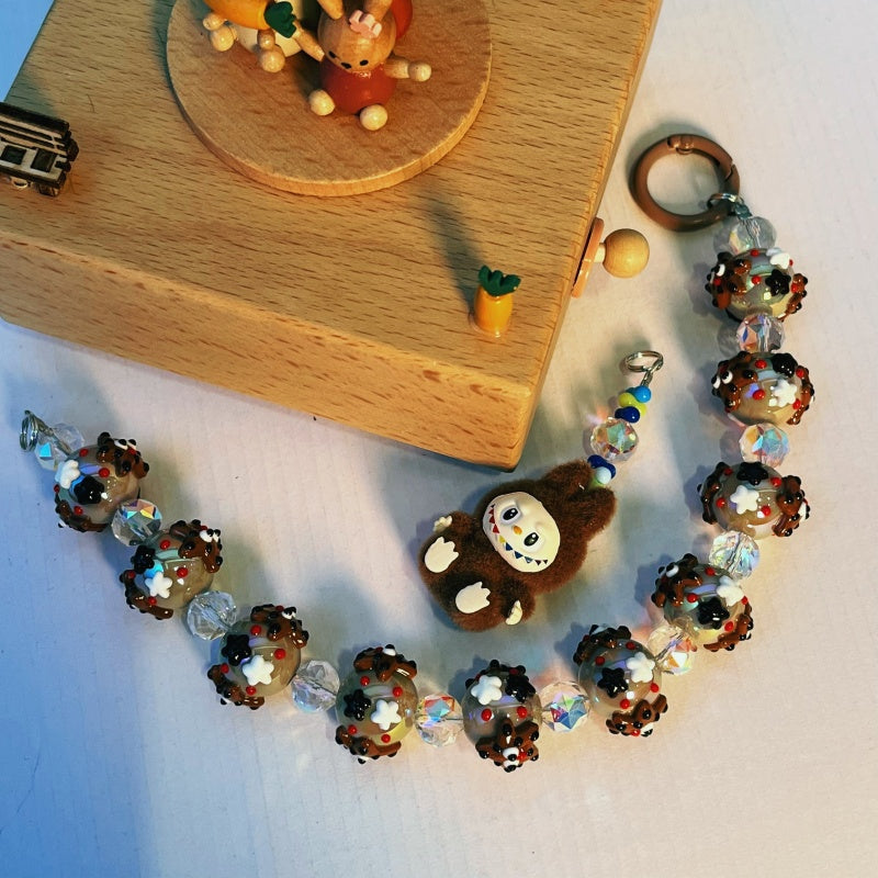 Labubu Yeti Style Phone Strap – Handmade Beaded Charm with Fuzzy Monster Doll & Cookie-Inspired Glass Beads – Cute Keychain & Bag Accessory